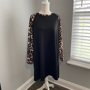Black dress with leopard sleeves